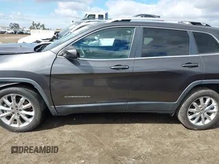 2016 Jeep Cherokee Limited with VIN 1C4PJLDS8GW233799, listed as a IAAI auction lot 41734376 with 114,187 mi miles. Bid and sale history available at carsss.com. Image 15.