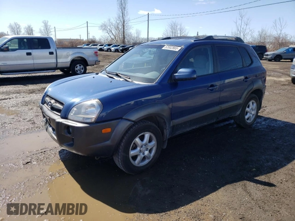 2005 Hyundai Tucson GL with VIN KM8JM72D55U167063, listed as a Copart auction lot 52002865 with 157,945 mi miles and Salvage Title. Bid and sale history available at carsss.com. Image 1.