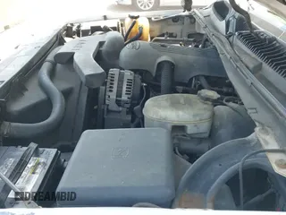 2003 Chevrolet Suburban LT z VIN 1GNEC16Z53J103817, wystawiony jako IAAI lot #43239105 z przebiegiem 320 563 mil mil oraz . Historia ofert i sprzedaży dostępna na DreamBid. Obrazek 12.