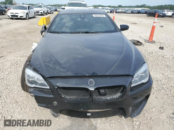 2016 BMW M6 z VIN WBS6E9C53GGF92689, wystawiony jako Copart lot #60226324 z przebiegiem Nie podano mil oraz Szkody całkowita. Historia ofert i sprzedaży dostępna na DreamBid. Obrazek 5.