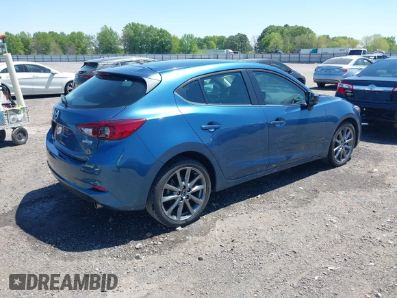2018 Mazda 3 Touring z VIN 3MZBN1L38JM185142, wystawiony jako IAAI lot #42004450 z przebiegiem 172 096 mil mil oraz . Historia ofert i sprzedaży dostępna na DreamBid. Obrazek 4.