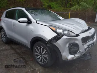 2018 Kia Sportage EX z VIN KNDPNCAC8J7309766, wystawiony jako IAAI lot #42219243 z przebiegiem 90 745 mil mil oraz . Historia ofert i sprzedaży dostępna na DreamBid. Obrazek 1.