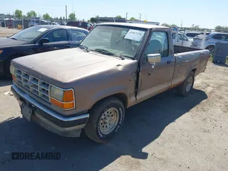 1992 Ford Ranger XLT with VIN 1FTCR10X4NPA94811, listed as a IAAI auction lot 42047550 with 37,763 mi miles. Bid and sale history available at carsss.com. Image 2.