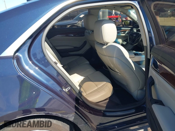 2016 Cadillac CTS RWD with VIN 1G6AP5SX8G0119984, listed as a IAAI auction lot 41679567 with 98,592 mi miles and . Bid and sale history available at DreamBid. Image 8.