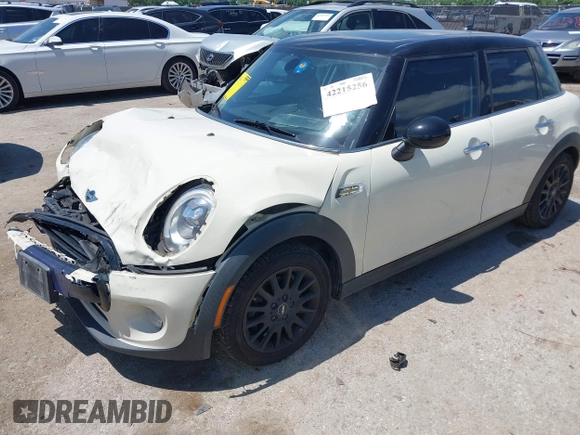 2016 MINI Hardtop 4 Door z VIN WMWXU1C50G2D08848, wystawiony jako IAAI lot #42215256 z przebiegiem 102 643 mil mil oraz . Historia ofert i sprzedaży dostępna na DreamBid. Obrazek 18.