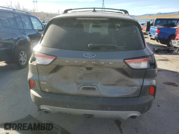 2021 Ford Escape SEL Hybrid z VIN 1FMCU9CZ9MUA86970, wystawiony jako Copart lot #84290064 z przebiegiem 32 019 mil mil oraz Szkoda całkowita • Salvage title. Historia ofert i sprzedaży dostępna na DreamBid. Obrazek 6.