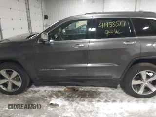 2016 Jeep Grand Cherokee Limited 75th Anniversary with VIN 1C4RJFBG3GC311089, listed as a IAAI auction lot 41953517 with 127,720 mi miles and . Bid and sale history available at DreamBid. Image 14.