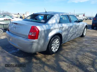 2008 Chrysler 300 LX with VIN 2C3KA43R48H251025, listed as a IAAI auction lot 41510553 with 104,103 mi miles. Bid and sale history available at carsss.com. Image 4.