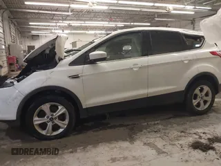 2013 Ford Escape SE with VIN 1FMCU9GX8DUC68815, listed as a IAAI auction lot 42028850 with 83,297 mi miles and . Bid and sale history available at DreamBid. Image 14.