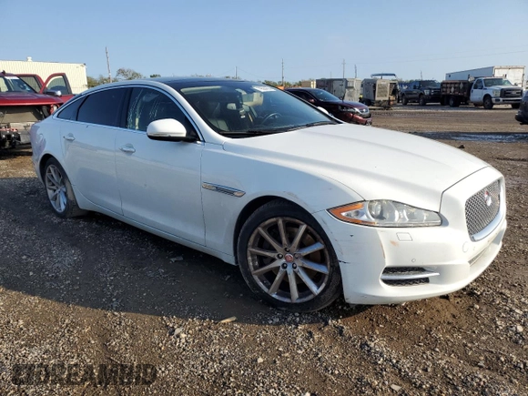2014 Jaguar XJ Portfolio with VIN SAJWA2GZ3E8V60788, listed as a Copart auction lot 43272405 with 97,196 mi miles and Salvage title. Bid and sale history available at DreamBid. Image 4.