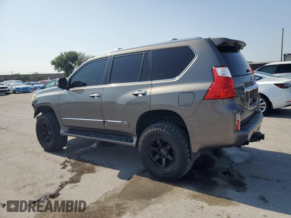 2010 Lexus GX 460 Premium with VIN JTJJM7FX5A5011762, listed as a Copart auction lot 56207715 with 185,360 mi miles and Salvage title. Bid and sale history available at DreamBid. Image 2.