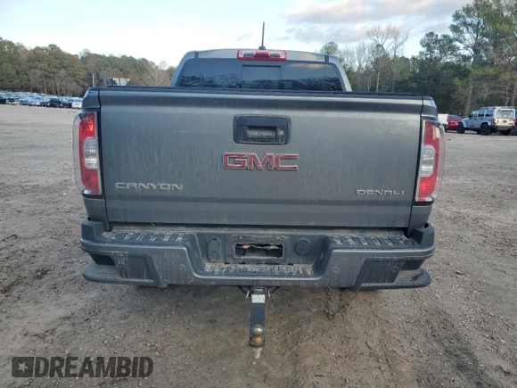 2020 GMC Canyon 4WD Denali with VIN 1GTG6EEN4L1245073, listed as a Copart auction lot 80462024 with 99,269 mi miles and Salvage Title. Bid and sale history available at carsss.com. Image 6.