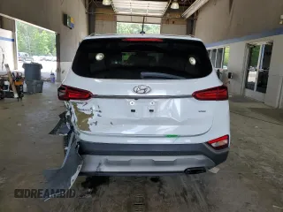 2019 Hyundai Santa Fe SE z VIN 5NMS2CAD4KH115371, wystawiony jako Copart lot #59180895 z przebiegiem 127 444 mil mil oraz Szkoda całkowita • Salvage title. Historia ofert i sprzedaży dostępna na DreamBid. Obrazek 6.