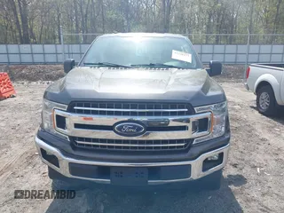 2018 Ford F-150 XL with VIN 1FTEW1CP2JFB50015, listed as a IAAI auction lot 41938177 with 248,137 mi miles and . Bid and sale history available at DreamBid. Image 12.