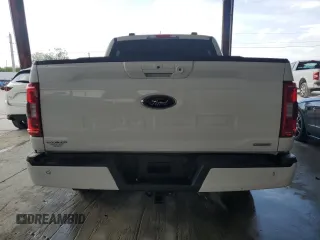 2023 Ford F-150 XL with VIN 1FTEW1CP9PKD19429, listed as a Copart auction lot 58021125 with 13,678 mi miles and Salvage title. Bid and sale history available at DreamBid. Image 6.