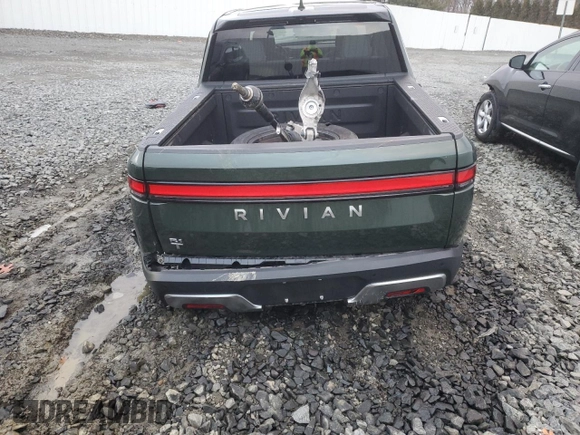 2024 Rivian R1T Adventure z VIN 7FCTGCAA1RN030829, wystawiony jako Copart lot #81459854 z przebiegiem Nie podano mil oraz Szkody całkowita. Historia ofert i sprzedaży dostępna na DreamBid. Obrazek 6.