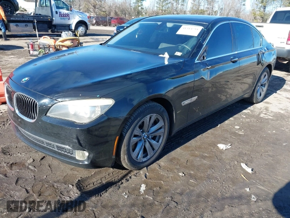 2011 BMW 7 Series 740i with VIN WBAKA4C58BC392020, listed as a IAAI auction lot 41314751 with 116,553 mi miles. Bid and sale history available at carsss.com. Image 17.