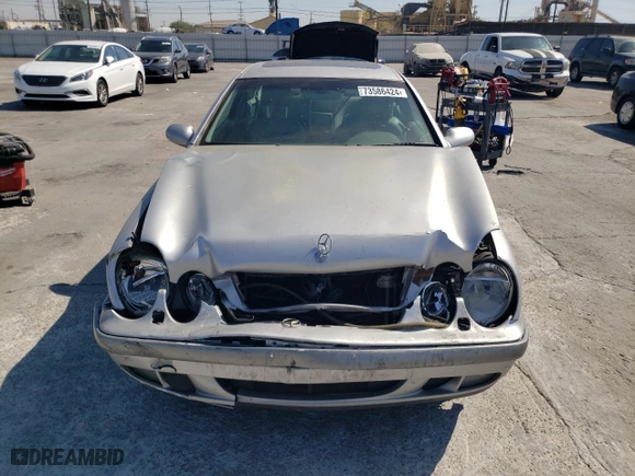 1999 Mercedes-Benz CLK-Class with VIN WDBLJ65G9XF065356, listed as a Copart auction lot 73586424 with 228,410 mi miles and Salvage Title. Bid and sale history available at carsss.com. Image 5.