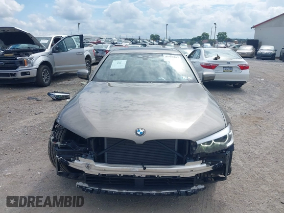 2018 BMW 5 Series 530i xDrive with VIN WBAJA7C55JG909519, listed as a IAAI auction lot 42650263 with 57,077 mi miles and . Bid and sale history available at DreamBid. Image 12.