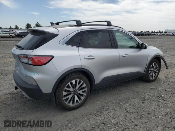 2020 Ford Escape Titanium with VIN 1FMCU9J99LUB07009, listed as a Copart auction lot 63213495 with 61,376 mi miles and Salvage title. Bid and sale history available at DreamBid. Image 3.