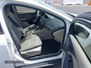 2012 Ford Focus SE with VIN 1FAHP3F24CL462319, listed as a IAAI auction lot 41981509 with 124,831 mi miles. Bid and sale history available at carsss.com. Image 5.