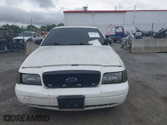 2007 Ford Police Interceptor z VIN 2FAFP71W27X105075, wystawiony jako IAAI lot #42219813 z przebiegiem Nie podano mil oraz . Historia ofert i sprzedaży dostępna na DreamBid. Obrazek 11.