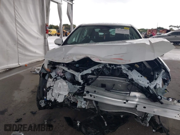 2025 Toyota Camry LE with VIN 4T1DAACK9SU112515, listed as a IAAI auction lot 41932562 with 587 mi miles and . Bid and sale history available at DreamBid. Image 12.