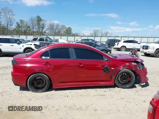 2008 Mitsubishi Lancer Evolution GSR with VIN JA3AW86V38U050561, listed as a IAAI auction lot 41879629 with 104,905 mi miles. Bid and sale history available at carsss.com. Image 13.