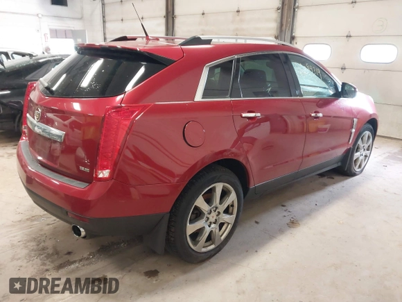 2012 Cadillac SRX Performance Collection with VIN 3GYFNEE36CS657582, listed as a IAAI auction lot 42084319 with 171,335 mi miles. Bid and sale history available at carsss.com. Image 4.