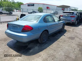 2007 Ford Taurus SE with VIN 1FAFP53U97A202542, listed as a IAAI auction lot 42362224 with Not provided miles and . Bid and sale history available at DreamBid. Image 4.