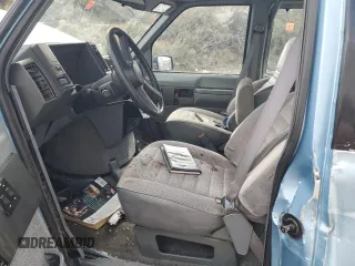 1989 GMC Safari z VIN 1GKDM15Z4KB517560, wystawiony jako Copart lot #51775615 z przebiegiem 152 882 mil mil oraz Szkody całkowita. Historia ofert i sprzedaży dostępna na DreamBid. Obrazek 7.
