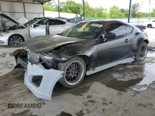 2014 Subaru BRZ Limited с VIN JF1ZCAC14E9601722, выставлен на аукционе Copart как лот 56002685 с пробегом 76 859 миль миль и Списание • Salvage title. История ставок и продаж доступна на DreamBid. Изображение 1.