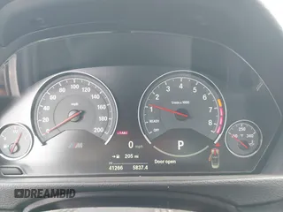 2018 BMW M4 with VIN WBS4Z9C5XJED22650, listed as a IAAI auction lot 42631888 with 41,266 mi miles and . Bid and sale history available at DreamBid. Image 7.