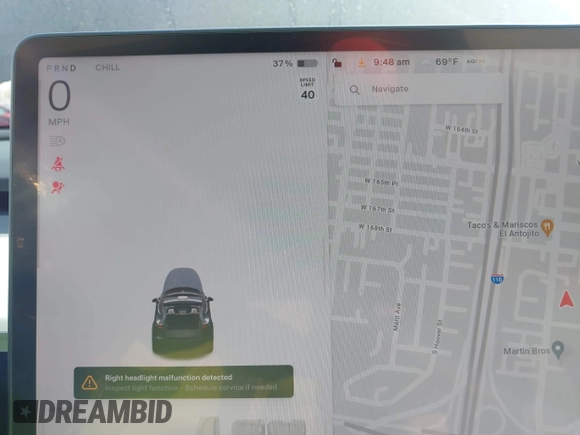 2023 Tesla Model Y Performance z VIN 7SAYGDEF6PF774965, wystawiony jako IAAI lot #41655550 z przebiegiem 33 824 mil mil oraz . Historia ofert i sprzedaży dostępna na DreamBid. Obrazek 7.