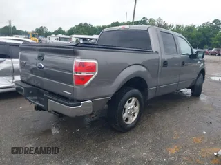 2013 Ford F-150 XL with VIN 1FTEW1CM6DFB68947, listed as a IAAI auction lot 42702746 with 152,623 mi miles and . Bid and sale history available at DreamBid. Image 4.
