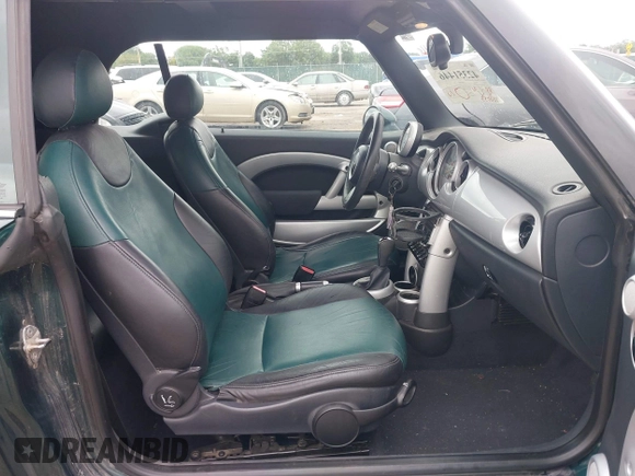 2005 MINI Convertible with VIN WMWRF33495TG11818, listed as a IAAI auction lot 42351446 with 100,033 mi miles and . Bid and sale history available at DreamBid. Image 5.