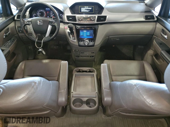 2014 Honda Odyssey EX-L with VIN 5FNRL5H6XEB134849, listed as a Copart auction lot 63617435 with 127,491 mi miles and Salvage title. Bid and sale history available at DreamBid. Image 8.