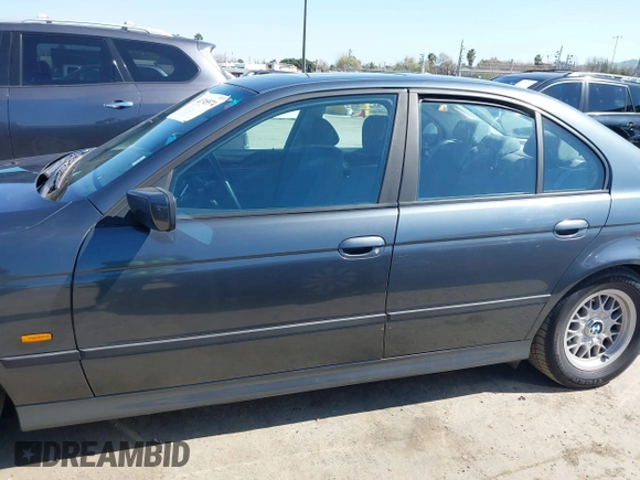 2000 BMW 5 Series 528iA with VIN WBADM6343YGV01651, listed as a IAAI auction lot 41745574 with 143,898 mi miles. Bid and sale history available at carsss.com. Image 14.