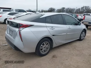 2017 Toyota Prius Two with VIN JTDKARFU7H3531159, listed as a IAAI auction lot 41282942 with 98,146 mi miles. Bid and sale history available at carsss.com. Image 4.