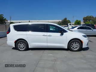 2024 Chrysler Pacifica Touring with VIN 2C4RC1FG7RR194974, listed as a IAAI auction lot 42459547 with 13,200 mi miles and . Bid and sale history available at DreamBid. Image 13.