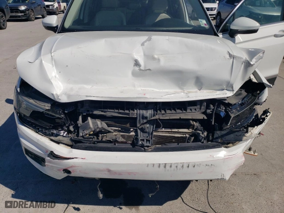2018 Volkswagen Tiguan SEL Premium with VIN 3VV5B7AX5JM026002, listed as a Copart auction lot 46036485 with 99,492 mi miles and Salvage Title. Bid and sale history available at carsss.com. Image 12.