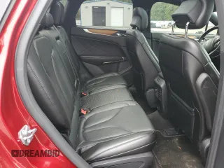 2015 Lincoln MKC z VIN 5LMTJ2AHXFUJ10820, wystawiony jako Copart lot #57139315 z przebiegiem 128 714 mil mil oraz Szkody całkowita. Historia ofert i sprzedaży dostępna na DreamBid. Obrazek 11.