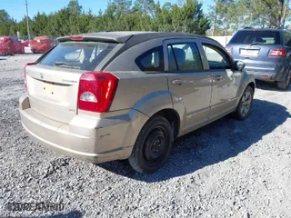 2010 Dodge Caliber SXT with VIN 1B3CB4HA4AD613312, listed as a IAAI auction lot 41746603 with 180,606 mi miles. Bid and sale history available at carsss.com. Image 4.
