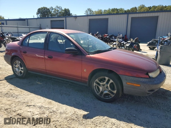 1998 Saturn SL z VIN 1G8ZH528XWZ144301, wystawiony jako Copart lot #75918414 z przebiegiem 219 256 mil mil oraz Szkoda całkowita • Salvage title. Historia ofert i sprzedaży dostępna na DreamBid. Obrazek 4.