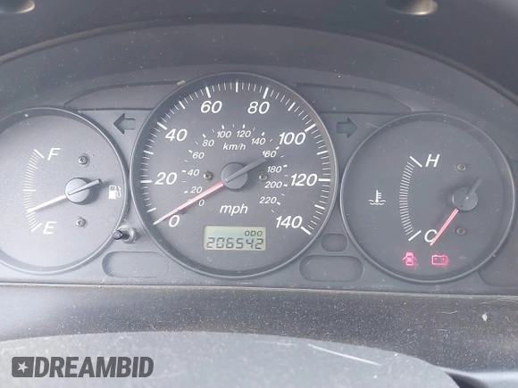 2000 Mazda Protege DX with VIN JM1BJ2227Y0303448, listed as a IAAI auction lot 41482747 with 206,542 mi miles and . Bid and sale history available at DreamBid. Image 7.