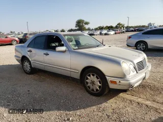 1998 Mercedes-Benz E-Class with VIN WDBJF65F1WA711193, listed as a Copart auction lot 76052034 with 168,935 mi miles and Salvage Title. Bid and sale history available at carsss.com. Image 4.