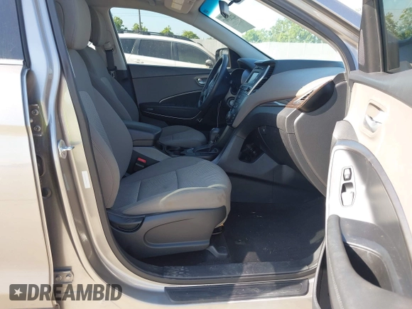 2017 Hyundai Santa Fe 2.4L z VIN 5XYZTDLB7HG444033, wystawiony jako IAAI lot #42263907 z przebiegiem 107 454 mil mil oraz . Historia ofert i sprzedaży dostępna na DreamBid. Obrazek 5.
