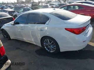 2015 Infiniti Q50 Premium with VIN JN1BV7AP6FM349523, listed as a IAAI auction lot 40940482 with 96,577 mi miles and . Bid and sale history available at DreamBid. Image 14.