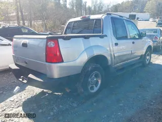 2005 Ford Explorer Sport Trac XLS with VIN 1FMZU67K25UA08134, listed as a IAAI auction lot 41852555 with 185,135 mi miles. Bid and sale history available at carsss.com. Image 4.
