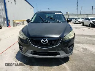 2014 Mazda CX-5 Touring with VIN JM3KE2CY5E0316077, listed as a Copart auction lot 58218735 with 190,789 mi miles and Salvage title. Bid and sale history available at DreamBid. Image 14.
